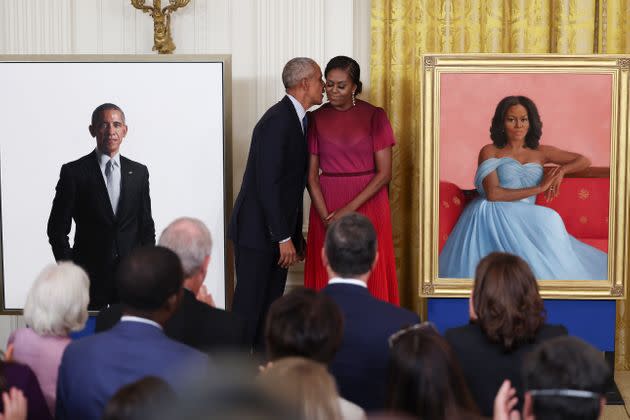 Former U.S. President Barack Obama and former first lady Michelle Obama unveil their official White House portraits. (Photo: Kevin Dietsch via Getty Images)