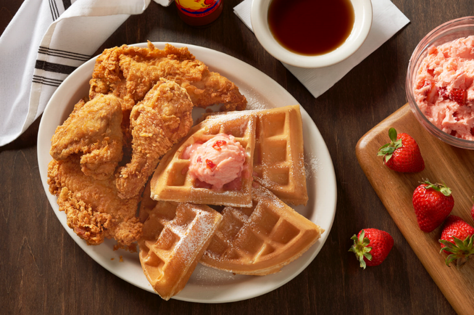 Metro Diner’s Fried Chicken & Waffles are plated with half a fried chicken and a Belgian waffle and topped with powdered sugar and strawberry butter. Its signature sweet and spicy sauce is included.