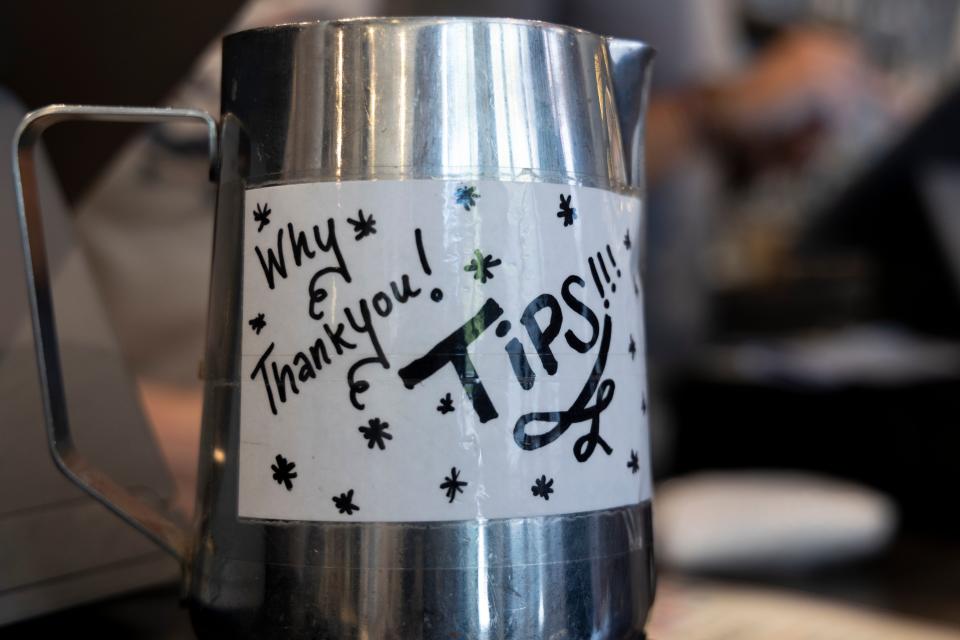 A view of the tip jar at Coffee Emporium in Cincinatti, pictured on Friday, May 26, 2023.