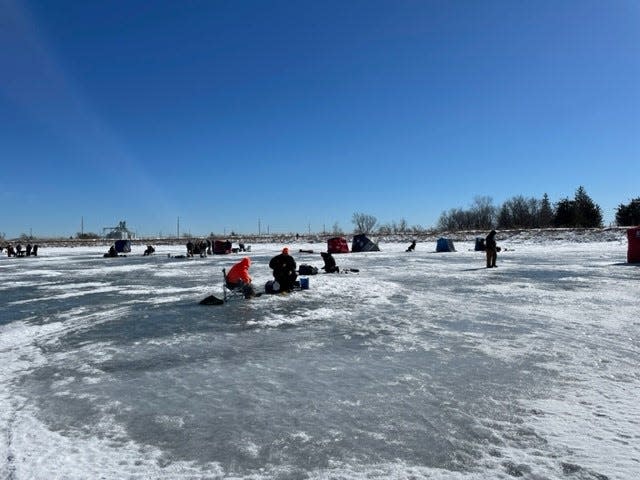 Despite the balmy temperatures of 48 degrees on Saturday, Feb. 11, 2023, Dakins Lake greeted ice fishing enthusiasts with about 12 inches of ice.