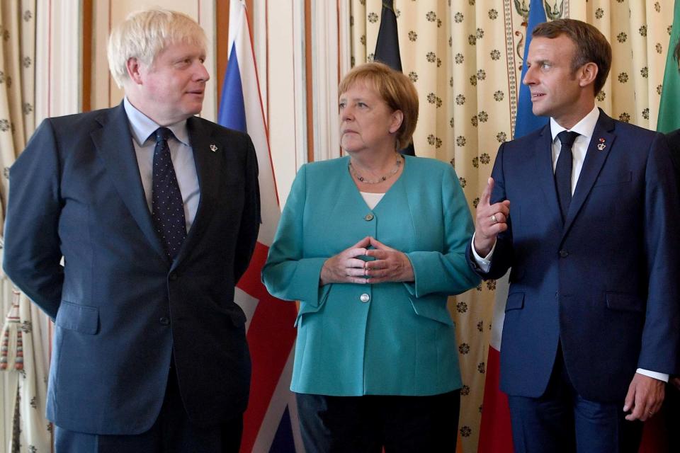 Prime Minister Boris Johnson, French president Emmanuel Macron and German chancellor Angela Merkel at the G7 summit (REUTERS)