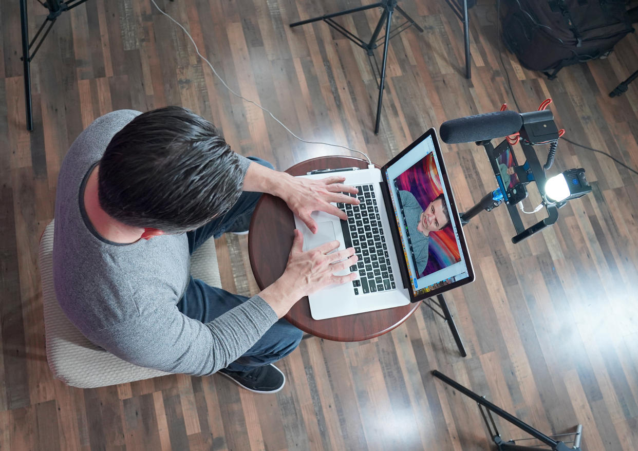 FRANKLIN SQUARE, NEW YORK - APRIL 19: A video producer works from his at-home studio to conduct remote interviews with talent on April 19, 2020 in Franklin Square, New York. As the coronavirus pandemic has shut down cities across the country, employees from the entertainment industry have adapted to their new work-from-home realities.  (Photo by Eric Stringer/Getty Images)