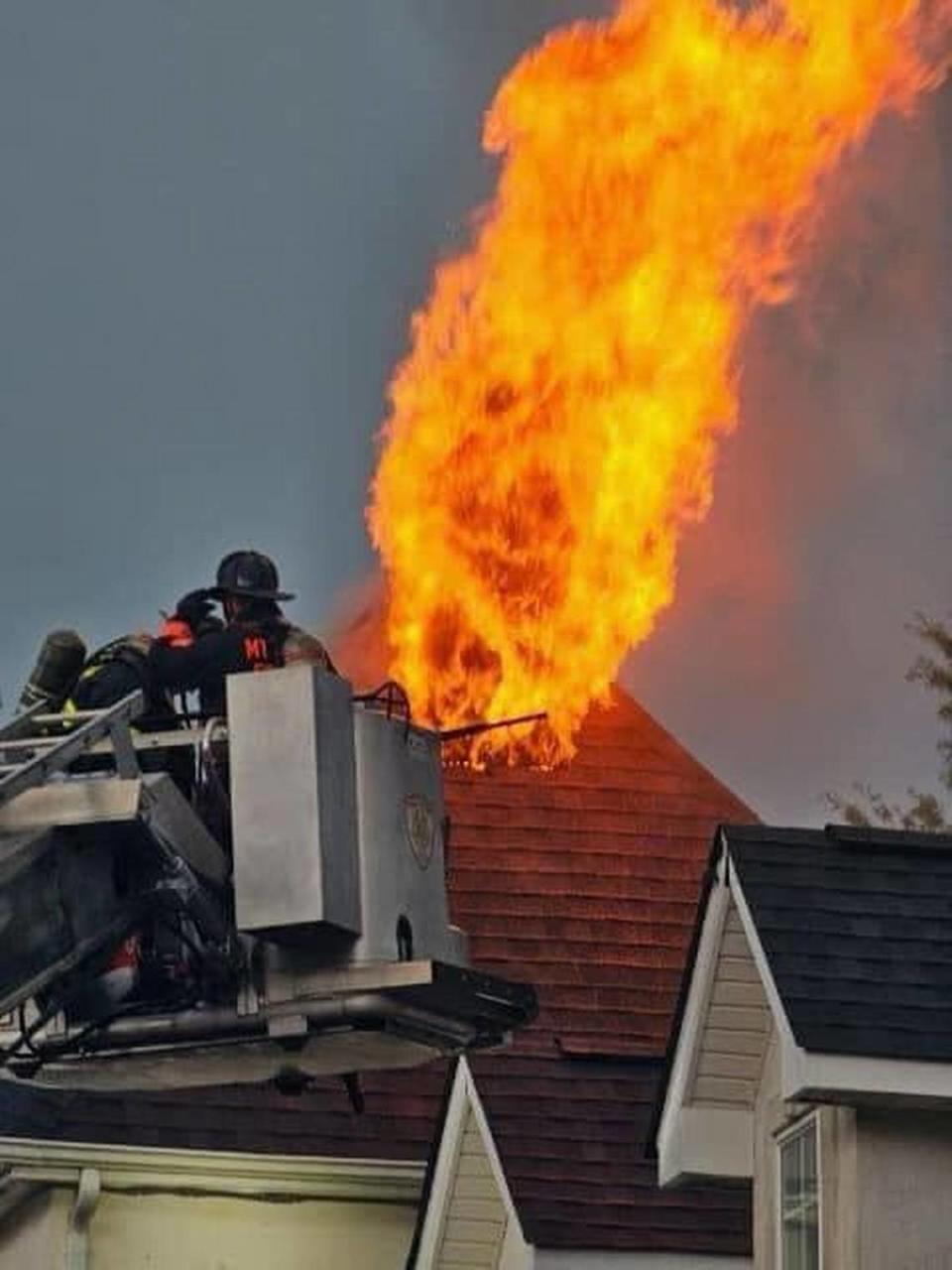 Flames from a lightning strike tore through the roof of a business on Williamson Road on Lake Norman in Mooresville NC during intense storms Monday, Aug. 8, 2023, town officials said without naming the business.