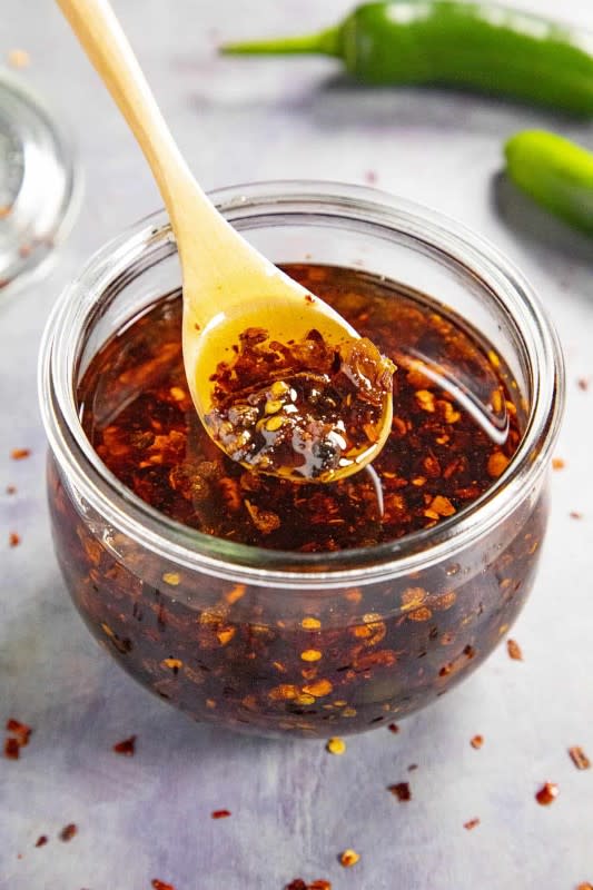 <p>Chili Pepper Madness</p><p>This homemade spicy chili crisp recipe is easy to make, the perfect condiment for spooning over anything from vegetables to eggs, meats and more.</p><p><strong>Get the recipe here: <a href="https://www.chilipeppermadness.com/recipes/chili-crisp/" rel="nofollow noopener" target="_blank" data-ylk="slk:Homemade Chili Crisp;elm:context_link;itc:0;sec:content-canvas" class="link ">Homemade Chili Crisp</a></strong></p>