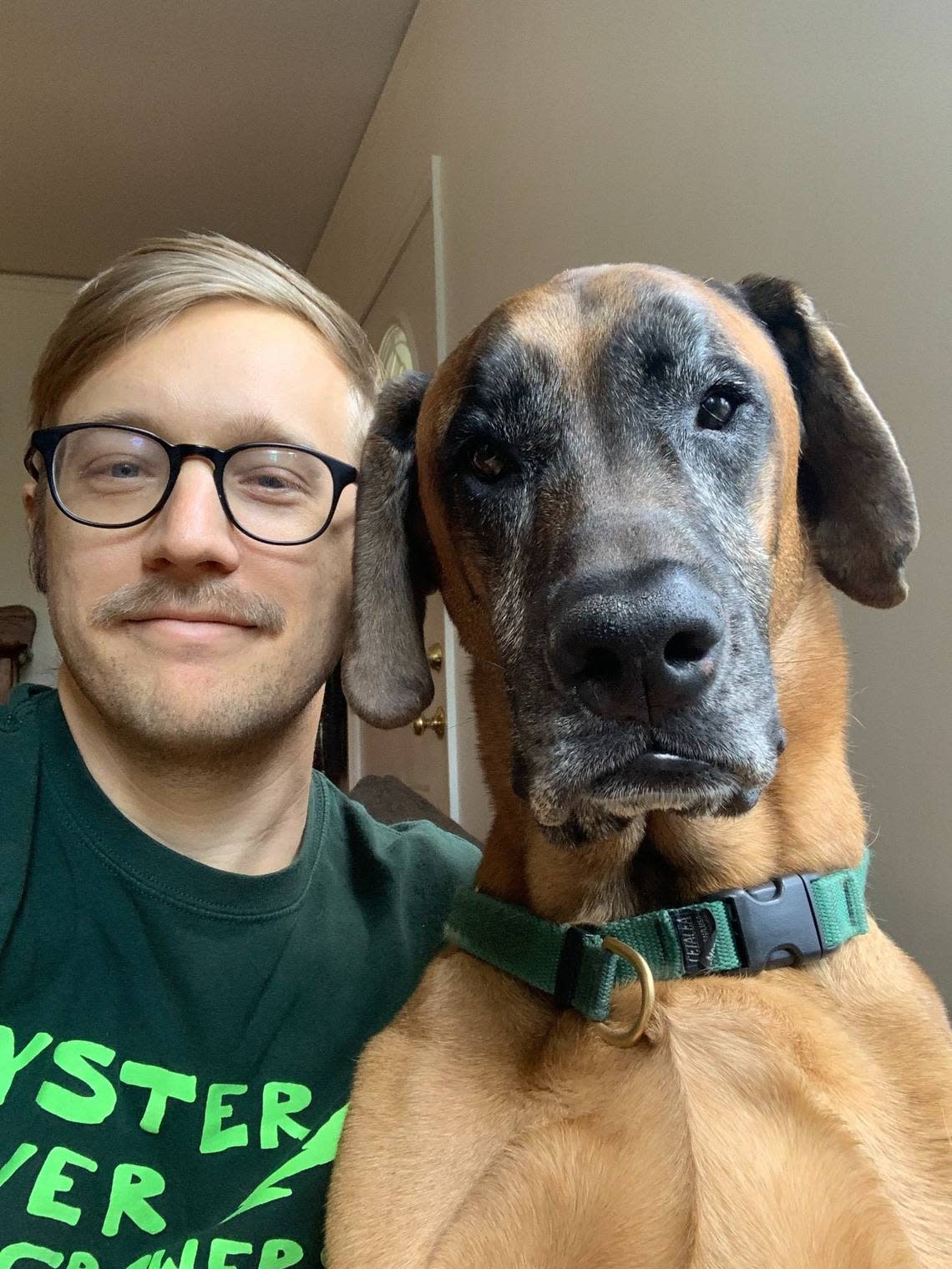 Drew Jackson with his dog Georgia, a very large baby waby.