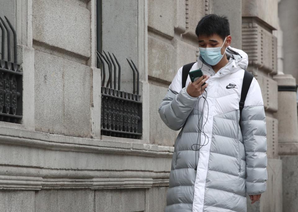 MADRID, SPAIN - JANUARY 28: An Asian boy walks down the street on the occasion of OMS elevates to ``high´´ the international threat from the Wuhan coronavirus on January 28, 2020 in Madrid, Spain. (Photo by Eduardo Parra/Europa Press via Getty Images)