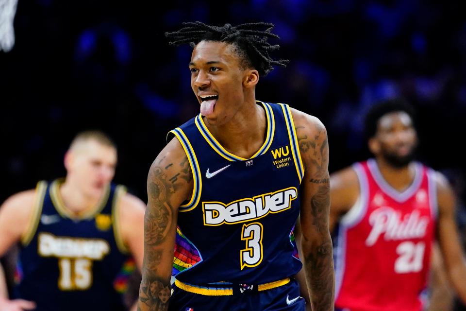 Denver Nuggets' Bones Hyland reacts after making a three-pointer during the second half of an NBA basketball game against the Philadelphia 76ers, Monday, March 14, 2022, in Philadelphia. (AP Photo/Matt Slocum)