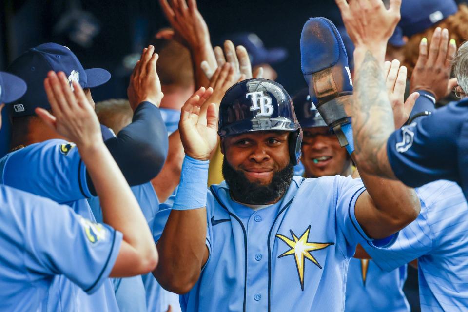 Tampa Bay Rays' Manuel Margot celebrates after scoring against the Boston Red Sox in the fifth inning of a baseball game in St. Petersburg, Fla., Thursday, April 13, 2023. (Ivy Ceballo/Tampa Bay Times via AP)