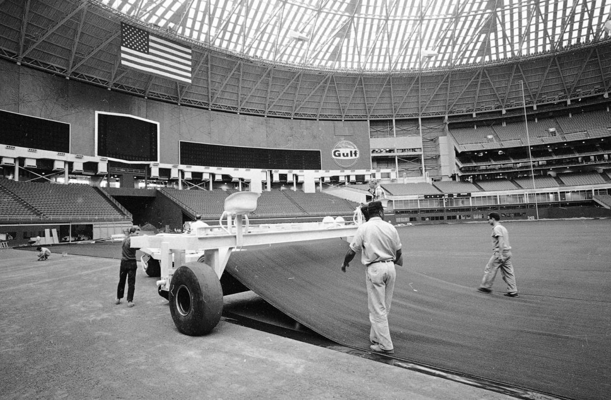 PHOTO: In this 1966 file photo, astroturf is being installed at the Astrodome in Houston. (AP)