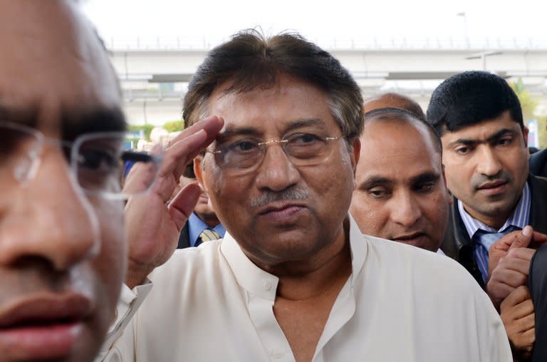 Pakistan's former military ruler Pervez Musharraf (C) arrives at the Dubai international airport in the Gulf emirate of Dubai, on March 24, 2013. Pakistan's former military ruler flew home on Sunday, landing at Karachi airport after more than four years in exile, defying a Taliban death threat to contest historic general elections