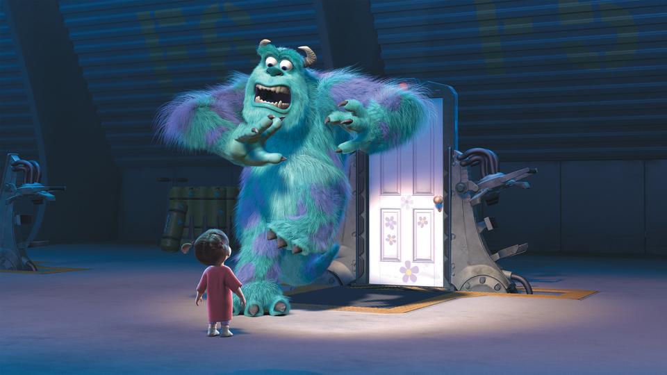 boo scares sully in an scene from monsters inc