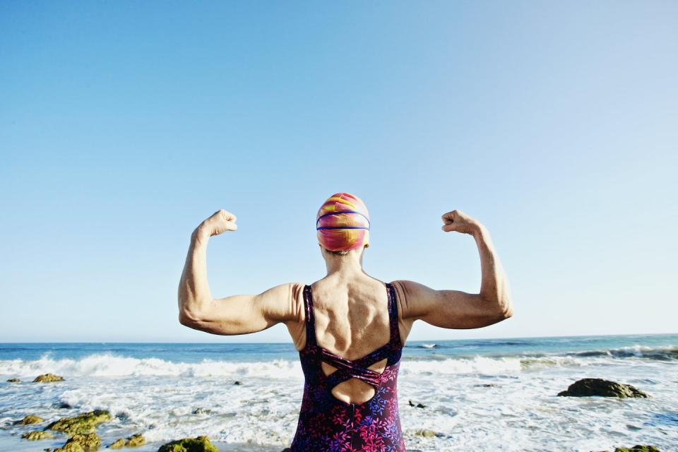 Strength training can help maintain overall fitness and allow you to keep doing other things you love as you age. <a href="https://www.gettyimages.com/detail/photo/older-caucasian-woman-flexing-her-muscles-on-beach-royalty-free-image/526298515" rel="nofollow noopener" target="_blank" data-ylk="slk:Peathegee Inc via Getty Images;elm:context_link;itc:0;sec:content-canvas" class="link ">Peathegee Inc via Getty Images</a>