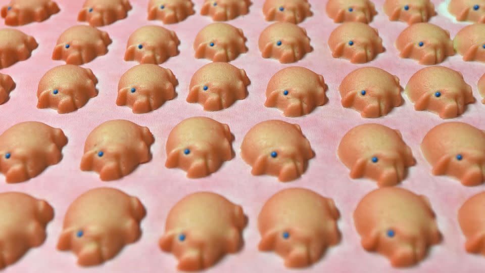 Fresh marzipan made in the shape of little pigges.  - PATRIK STOLLARZ/AFP/Getty Images