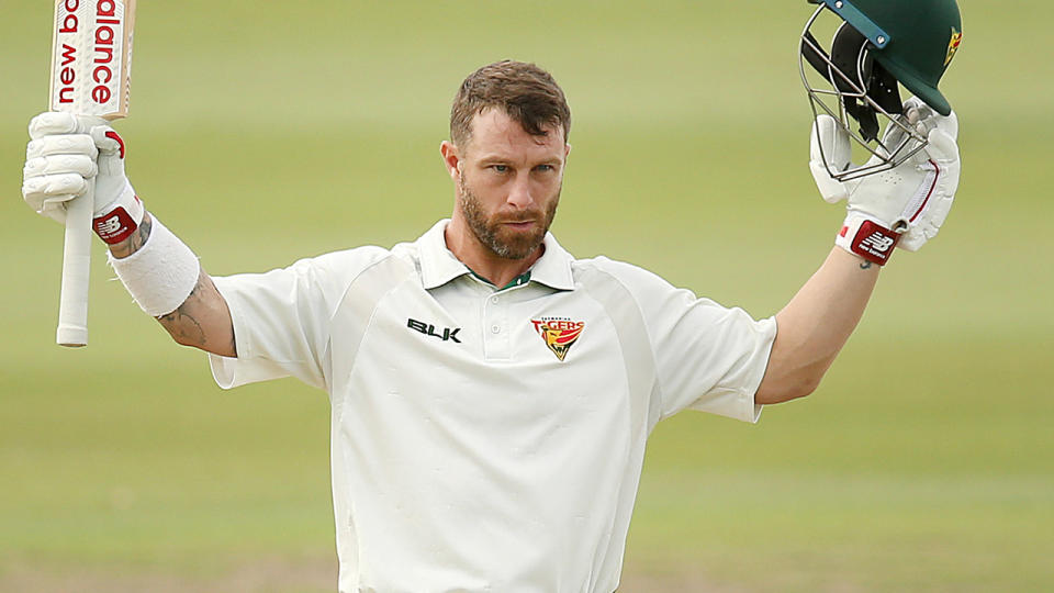 Matthew Wade celebrates a century. (Photo by Jono Searle/Getty Images)