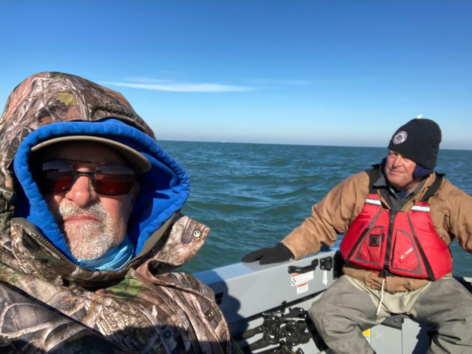 Bundled up, Art Holden and Gene Post troll on Nov. 22 out of Avon Lake for walleye, looking for a big fish to enter in the Walleye Slam and Fall Brawl.