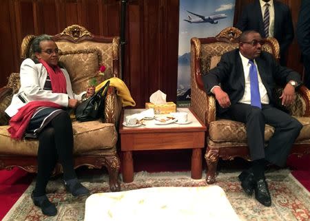 Former Ethiopian Prime Minister Hailemariam Desalegn and his wife Roman Tesfaye attend the ceremony as they resume flights to Eritrea's capital Asmara at the Bole International Airport in Addis Ababa, Ethiopia July 18, 2018. REUTERS/Kumera Gemechu