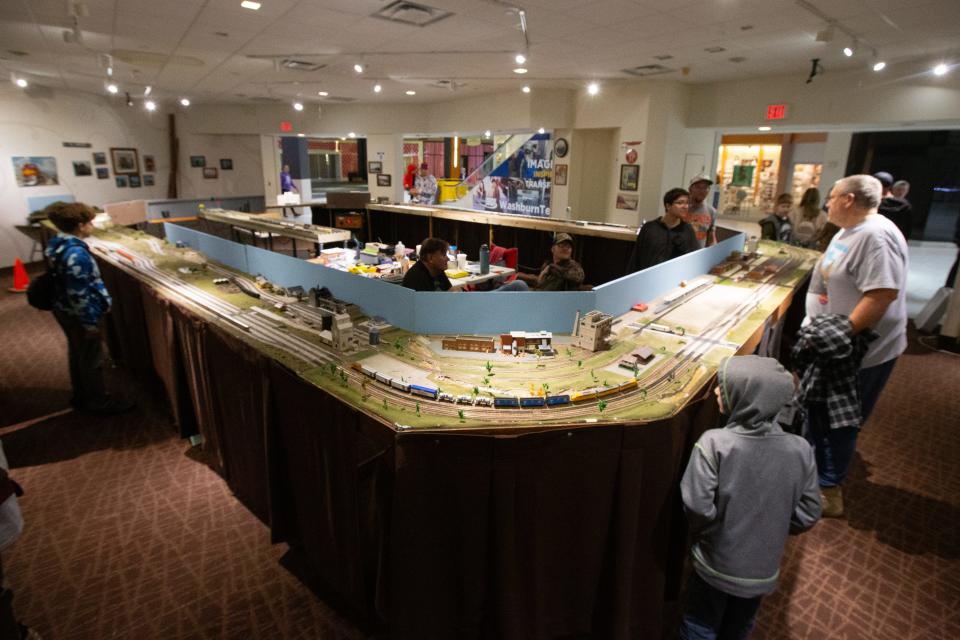 The Topeka N Trak layout at West Ridge Mall attracts people of all ages Saturday to see to-scale trains operate.