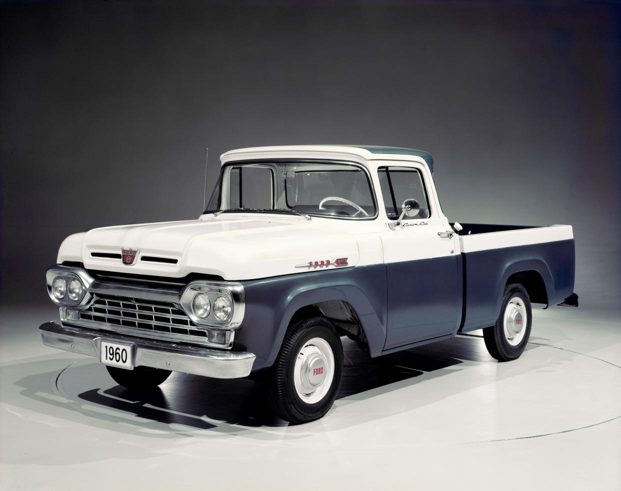 This is a 1960 Ford F-100 pickup truck. In 1959, The F-100 and F-250 pickups became the first Ford trucks to offer a four-wheel-drive option. The F150 is a light-duty, half-ton truck while an F-250 is a three-quarter ton heavy duty truck for serious towing and hauling.