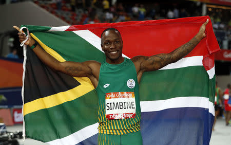 FILE PHOTO - Athletics - Gold Coast 2018 Commonwealth Games - Men's 100m Final - Carrara Stadium - Gold Coast, Australia - April 9, 2018. Gold medalist Akani Simbine of South Africa. REUTERS/Paul Childs