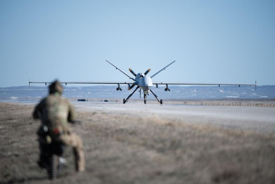 An MQ-9 Reaper with the 2nd Special Operations Squadron lands on Highway 287 during Exercise Agile Chariot near Rawlins, Wyoming, April 30, 2023.