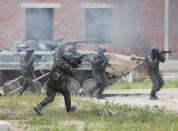 Servicemen from Ukraine, U.S., Poland and Lithuania take part in the "Three Swords-2021" military exercise in Lviv region