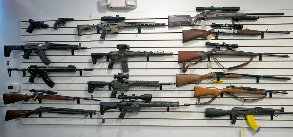 Several rifles are displayed on a wall for sale at Chuck Lovelace’s gun shop, Essential Shooting Supplies, in Park Falls. Lovelace spearheaded efforts to launch a suicide awareness and a gun storage program.n(Credit: Mike De Sisti / Milwaukee Journal Sentinel)