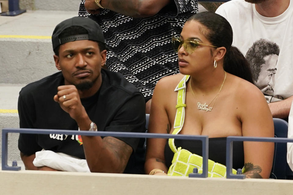 Washington Wizards guard Bradley Beal, left, watches play between Frances Tiafoe, of the United States, and Andrey Rublev, of Russia, during the quarterfinals of the U.S. Open tennis championships, Wednesday, Sept. 7, 2022, in New York. (AP Photo/Seth Wenig)