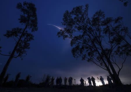 A United Launch Alliance Delta II rocket with the NASA Soil Moisture Active Passive (SMAP) observatory onboard is seen in this long exposure photograph as it launches from Space Launch Complex 2 at Vandenberg Air Force Base, California January 31, 2015. REUTERS/NASA/Bill Ingalls/Handout via Reuters