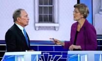 Former New York City Mayor Bloomberg talks with Senator Warren at the ninth Democratic 2020 U.S. Presidential candidates debate in Las Vegas Nevada, U.S.