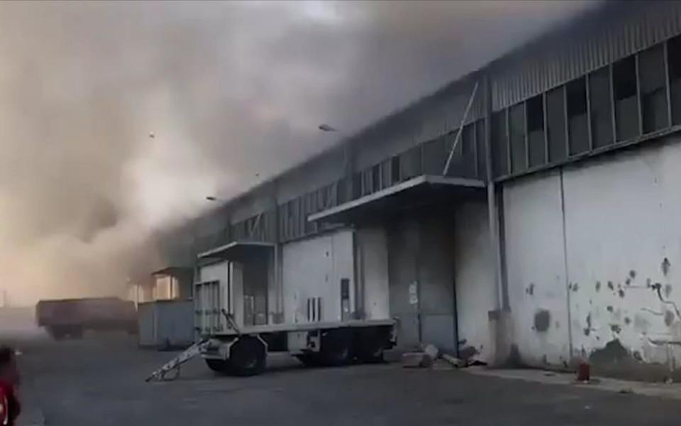 Smoke billows from the port warehouse - Twitter