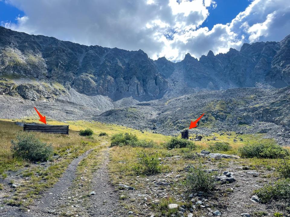 Arrows point to another cabin and ore shoot that are part of the ghost town.