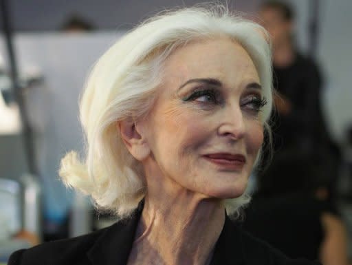 Legendary model Carmen Dell'Orefice, 81, awaits her turn at the make-up table backstage at the Marimekko spring-summer 2013 show during New York fashion week. Living legends from the earliest years of the supermodel era won big cheers and loud applause Monday, demonstrating that beauty has no sell-by date