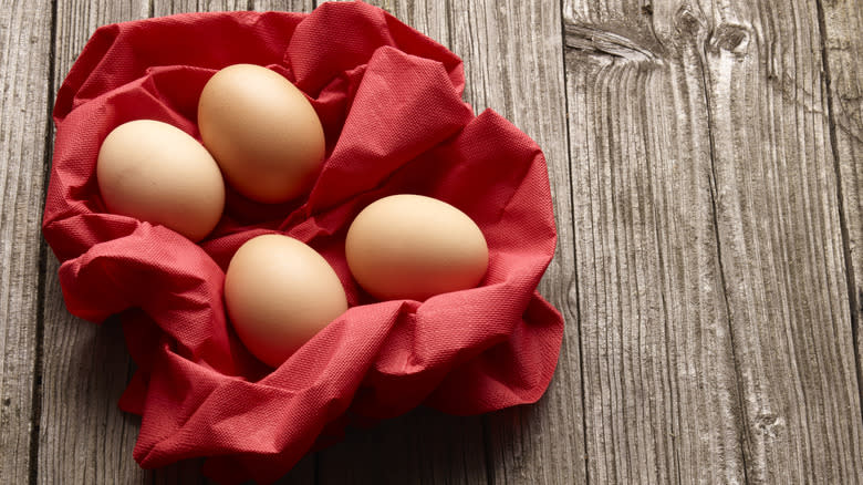 eggs in cloth on table