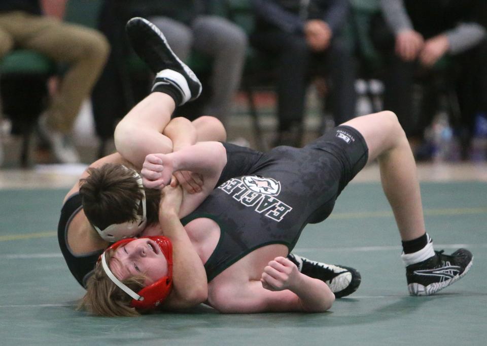 Emeric McBurney, top, of Perry defeated Finn Peeler, bottom, of GlenOak in a 113 pound bout during their match at GlenOak on Thursday, Jan. 27, 2022.