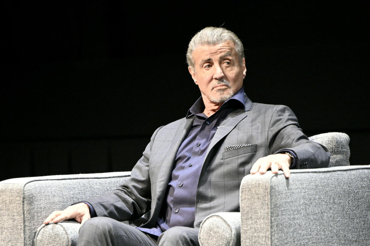 Sylvester Stallone speaks on stage at 