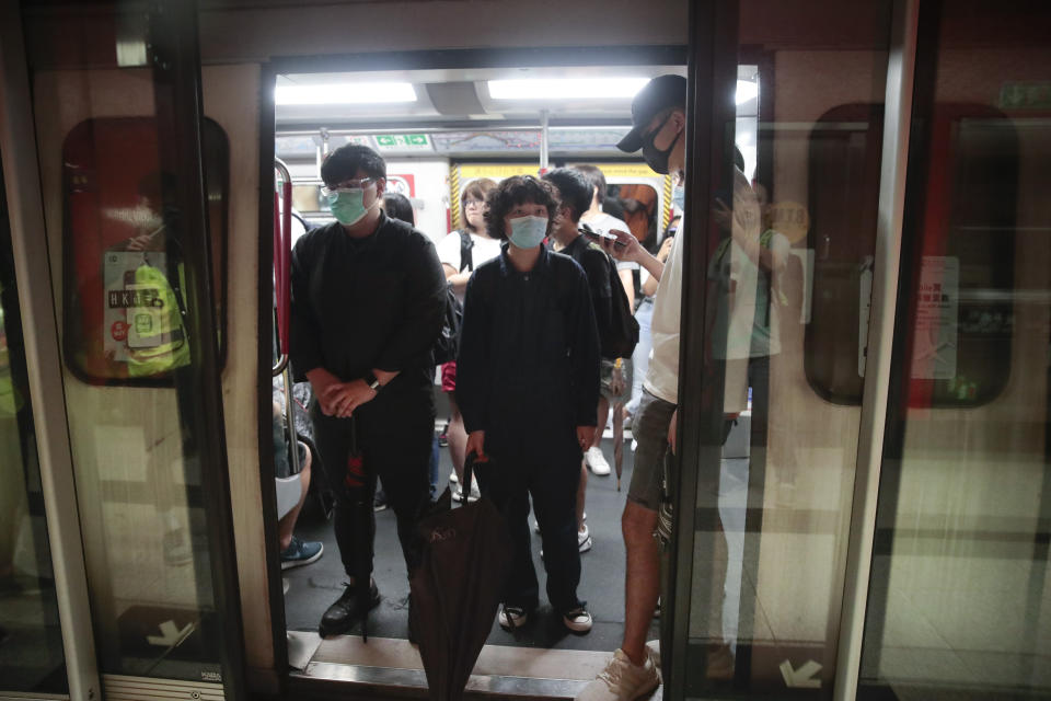 Protesters wearing masks occupy a train car at a subway station in Hong Kong, on Monday, Sept. 2, 2019. Hong Kong has been the scene of tense anti-government protests for nearly three months. The demonstrations began in response to a proposed extradition law and have expanded to include other grievances and demands for democracy in the semiautonomous Chinese territory. (AP Photo/Jae C. Hong)