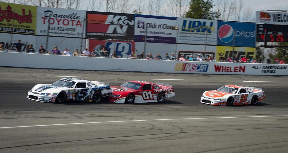 Lee Pulliam #5, Philip Morris #01, and Peyton Sellers #26 during the NASCAR Whelen All-American Series race prior to the South Boston 150 on March 30, 2019 at South Boston Speedway in South Boston, Virginia.