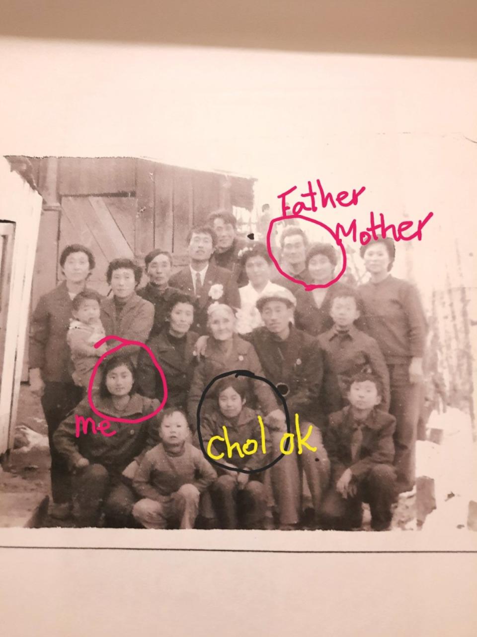 A photo from the early 1990s shows the family of Kim Kyu and her now missing sister, Kim Cheol-ok (Sourced/The Independent)