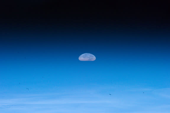 The Aug. 1, 2012, full moon appears squashed due to distortions by Earth's atmosphere in this photo by an astronaut on the International Space Station.