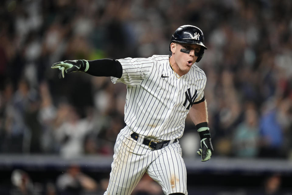 New York Yankees' Harrison Bader gestures to teamamtes after hitting a three-run home run during the eighth inning of a baseball game against the Baltimore Orioles Monday, July 3, 2023, in New York. (AP Photo/Frank Franklin II)