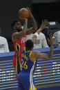 New Orleans Pelicans forward Naji Marshall (8) shoots over Golden State Warriors forward Kent Bazemore (26) during the first half of an NBA basketball game on Friday, May 14, 2021, in San Francisco. (AP Photo/Tony Avelar)