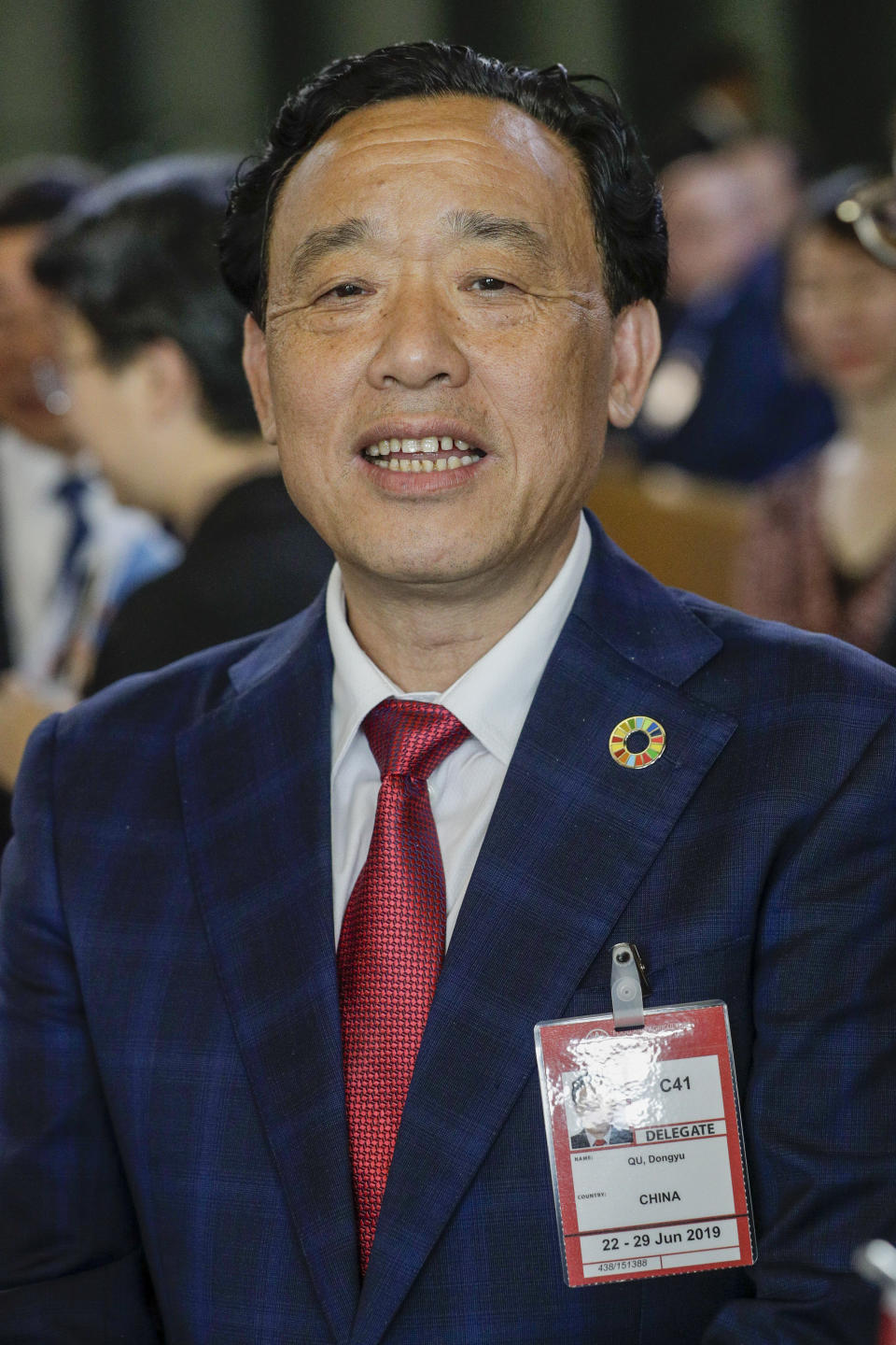 Qu Dongyu from China, one of the candidates for the Director-General position of the FAO (UN Food and Agriculture Organization), arrives to address a plenary meeting of the 41st Session of the Conference, at the FAO headquarters in Rome, Saturday, June 22, 2019. The new FAO Director-General will be voted on Sunday. (AP Photo/Andrew Medichini)