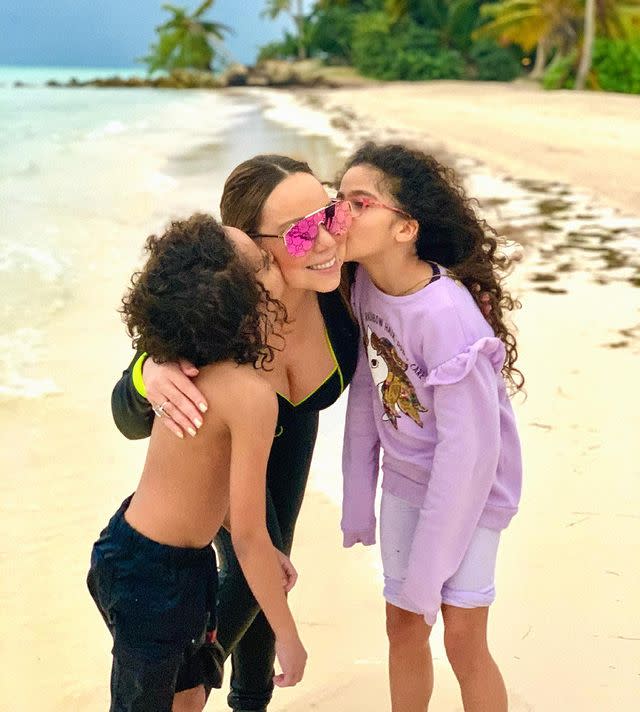 <p>The singer got sweet kisses from her twins Moroccan and Monroe. "All things are possible... Happy Mother's Day!!!" Carey captioned the beach portrait.</p>