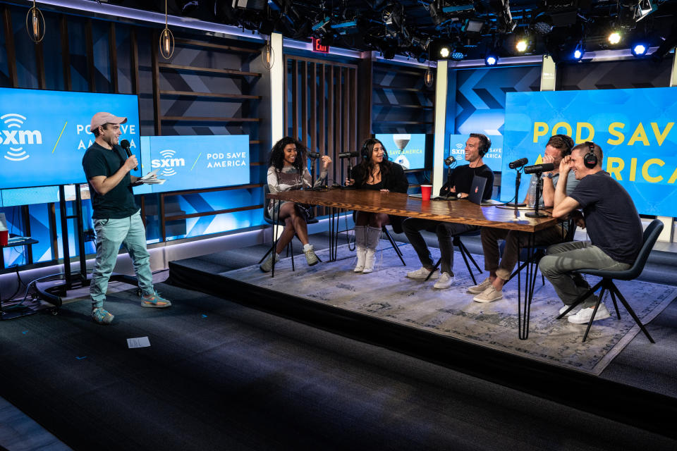 Left to right: Jon Lovett, Alycia Pascual-Peña, Yasmine Hamady, Jon Favreau, Tommy Vietor and Dan Pfeiffer at a live taping of “Pod Save America” at SiriusXM’s L.A. Garage on Sept. 28 (Photo credit: Matthew Misisco)