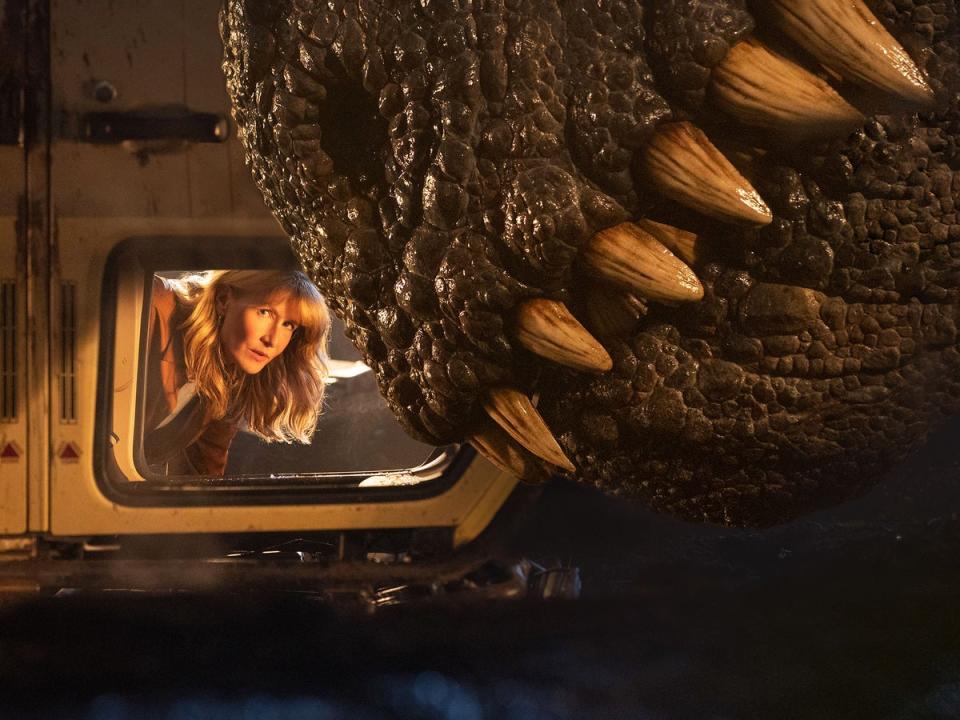 The jaws of death: Laura Dern and a really big dinosaur in ‘Jurassic World Dominion' (Universal Pictures)