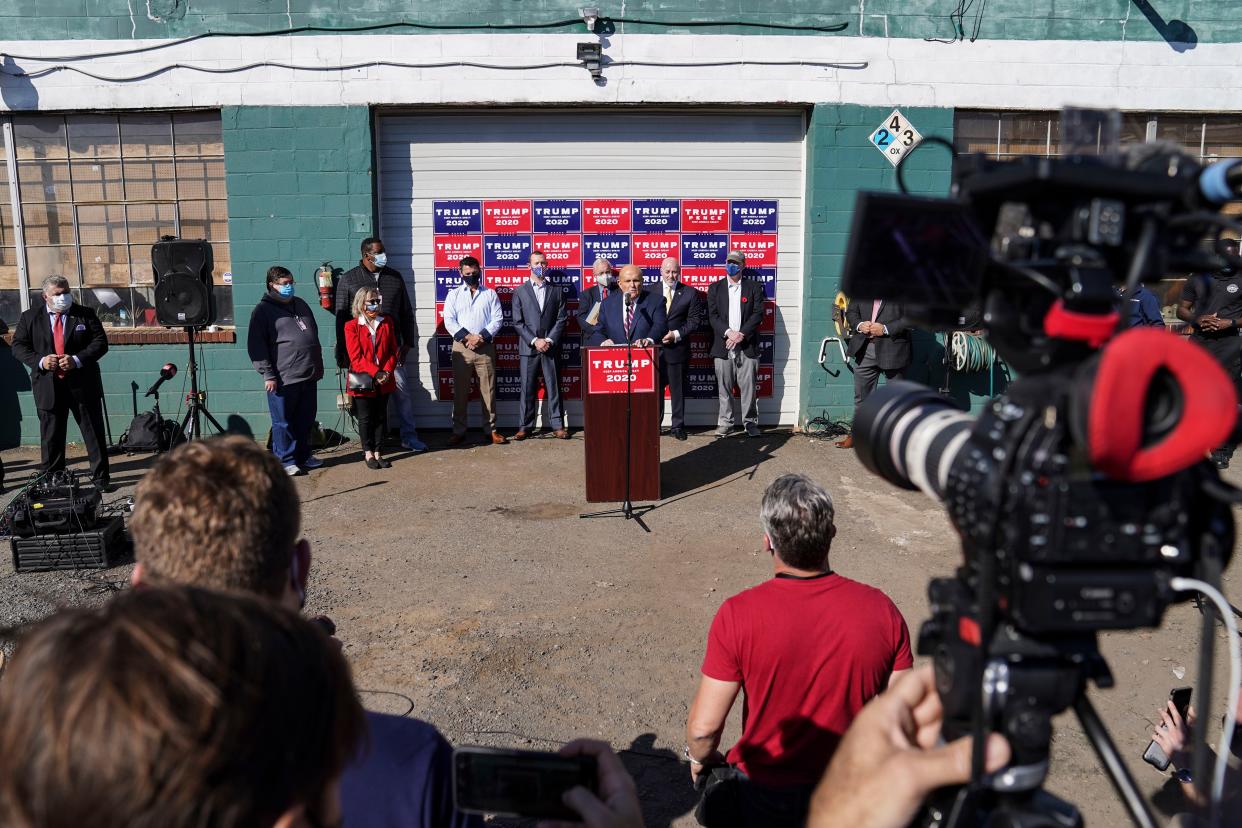 Former New York mayor Rudy Giuliani, a lawyer for President Donald Trump, speaks during a news conference at Four Seasons Total Landscaping on legal challenges to vote counting in Pennsylvania, Saturday Nov. 7, 2020, in Philadelphia.