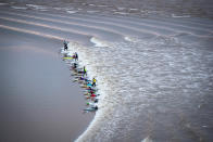 <p>Surfers attempt to ride the Severn Bore as it passes in Newnham on Severn on February 2, 2018 in Gloucestershire, England. The bore, which follows this week’s super moon and was given a four-star rating as it is likely to be one of the largest in 2018, attracts surfers from around the world to ride it. The Severn bore, a natural tidal phenomenon and one of the largest in the world, pushes a 1.2-metre wave up the Severn Estuary and is at its most dramatic in the spring when the tides are at their highest. Photo from Matt Cardy/Getty Images. </p>