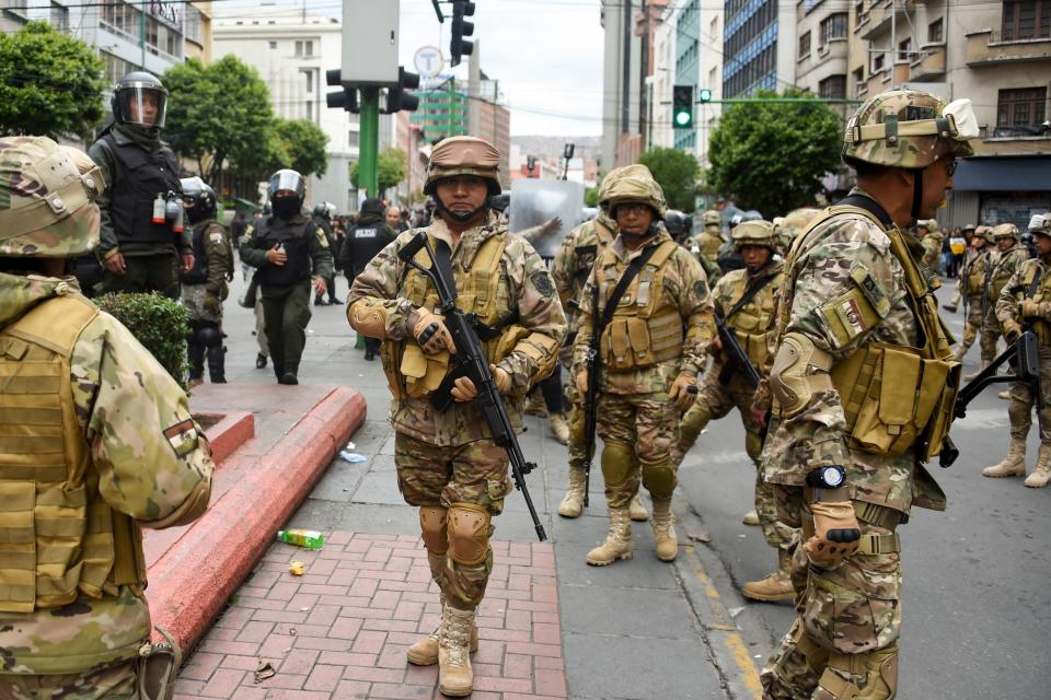 Militarized Bolivian police stand guard as supporters of Evo Morales demonstrate in La Paz on Nov.14, 2019. (Photo: AIZAR RALDES via Getty Images)