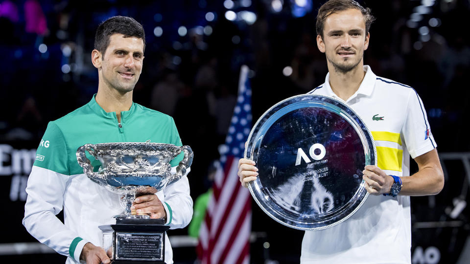 Novak Djokovic and Daniil Medvedev, pictured here after the Australian Open final. 