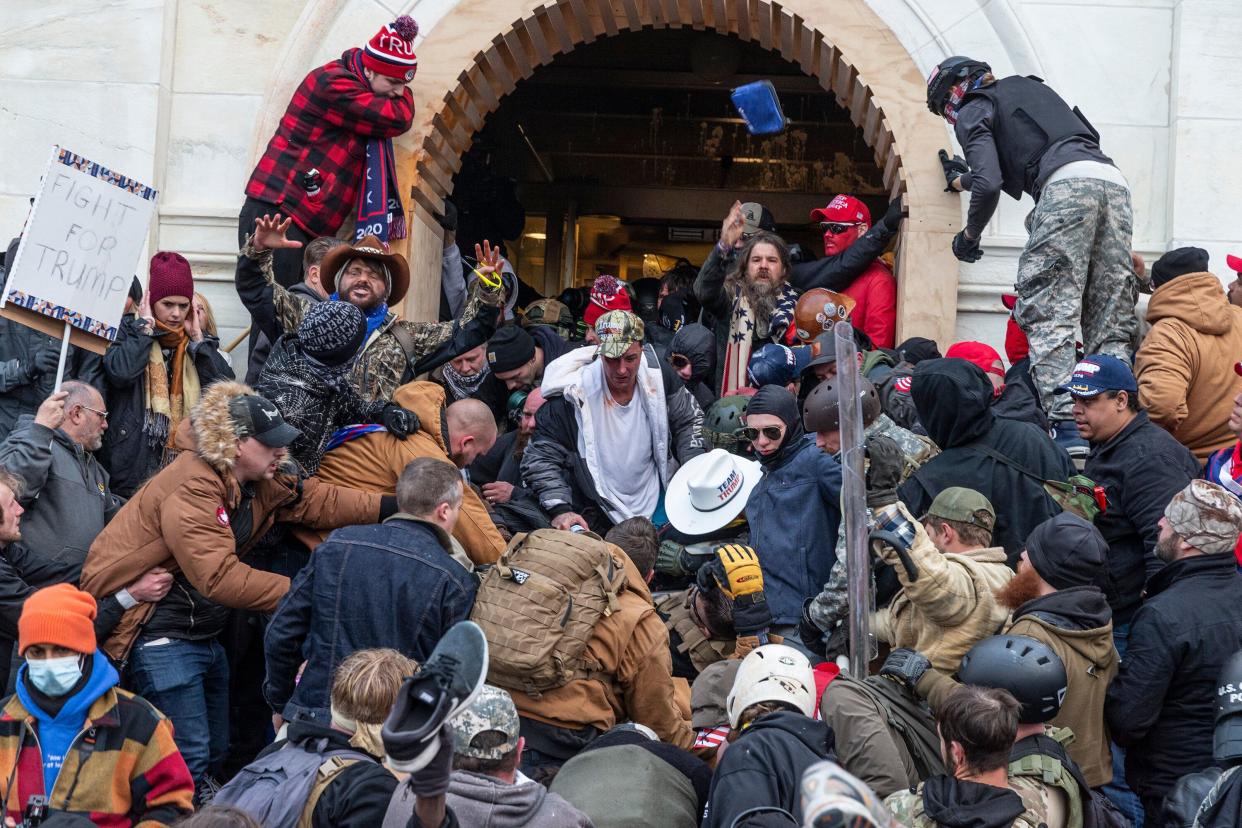 Rioters clash with police as they try to enter the Capitol on Jan. 6. (Photo: Pacific Press via Getty Images)